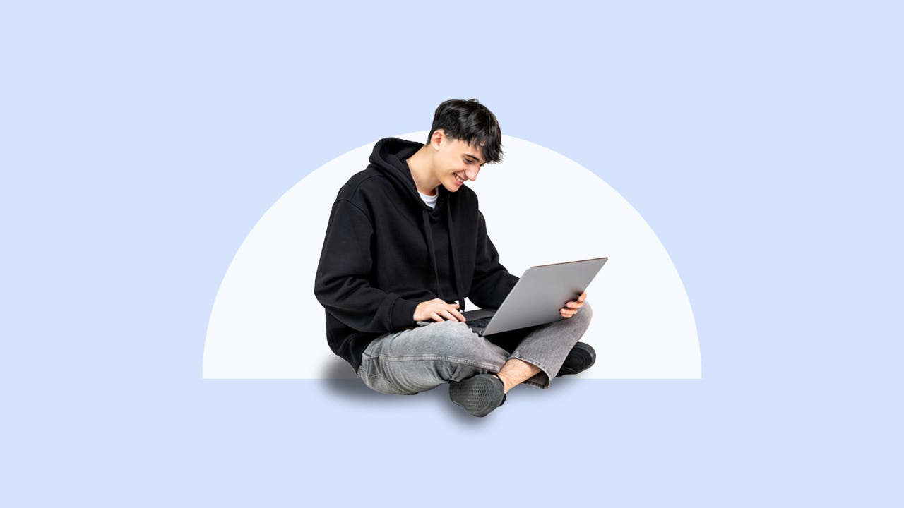 Happy young person on a laptop