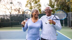 Couple Walking Off the Tennis Court