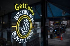 A sign for a Bitcoin automated teller machine