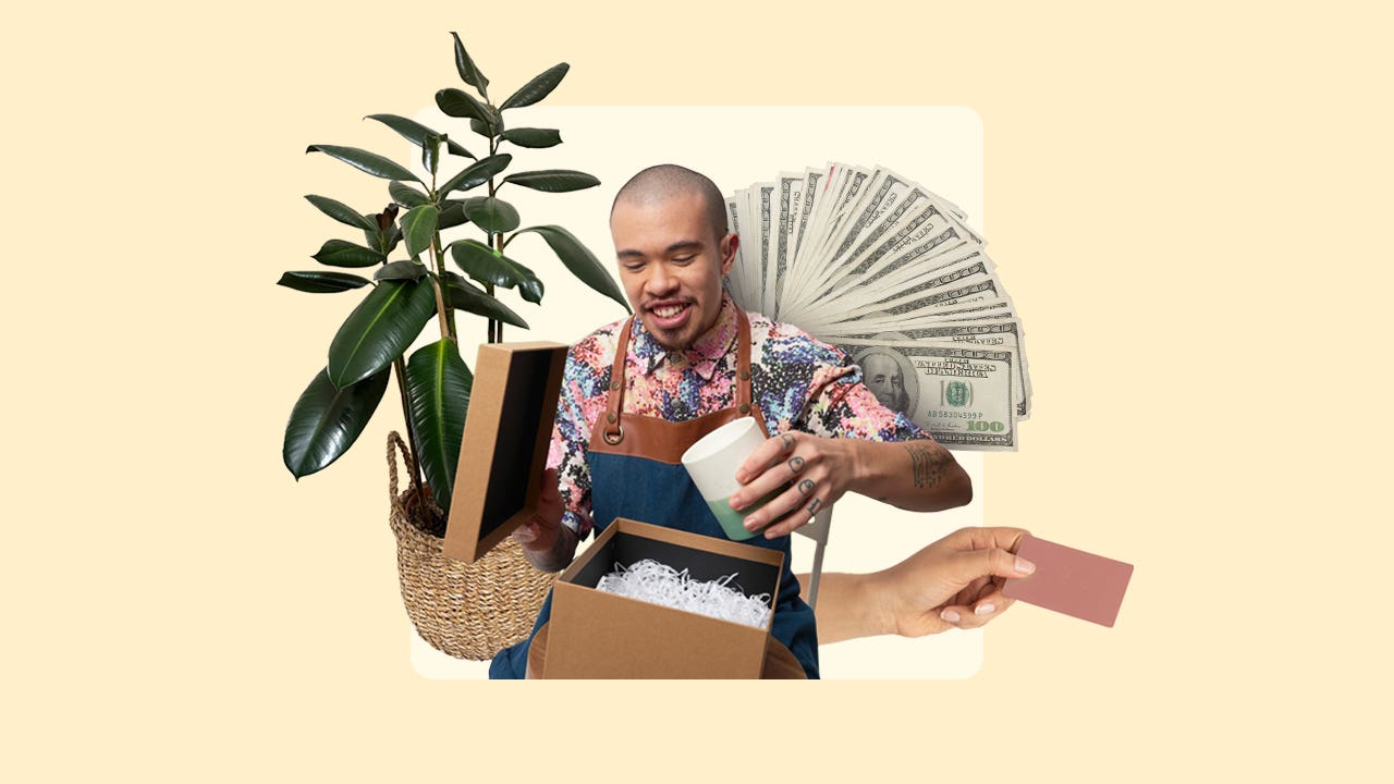 plantshop owner watering plants