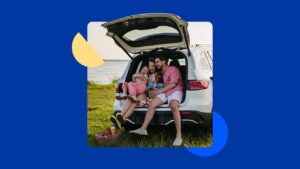 Family sitting in back of car