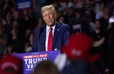 Republican presidential nominee former President Donald Trump speaks at a rally during the early-morning hours of election day on November 5, 2024 in Grand Rapids, Michigan.