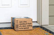 Amazon cardboard box on doorstep.