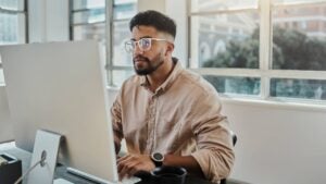 Information technology businessman working on computer in office