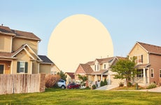 suburban homes with green grass - yellow circle blue sky