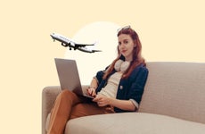 design image of ana staples sitting on a couch with her laptop with a plane in the background