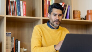 businessman in a virtual meeting at a coworking office