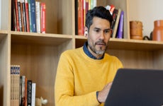 businessman in a virtual meeting at a coworking office