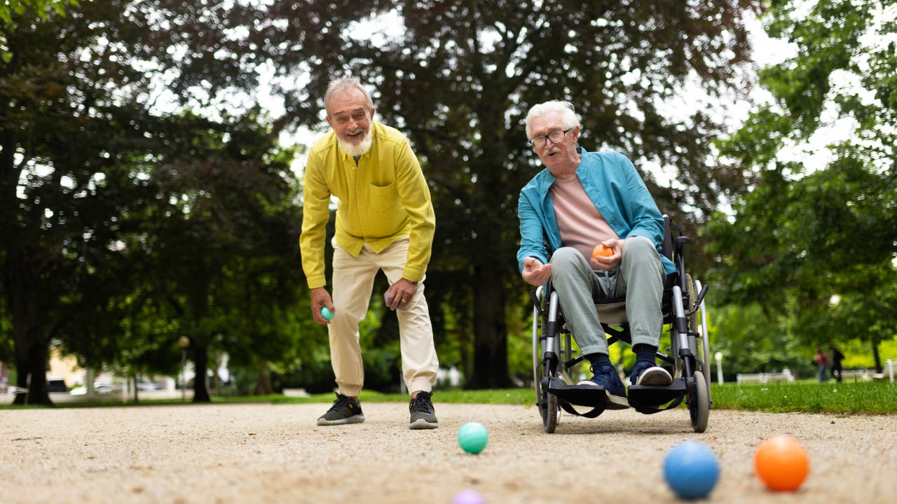 Senior friends playing pétanque