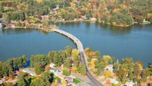 An aerial view of Long Bridge in Chetek, Wisconsin, between Chetek and Prairie Lake. Shot from the open window of a small airplane.