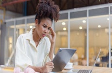 businesswoman stressed from work