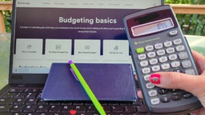 finances with calculator and checkbook