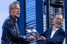 Charles Liang, chief executive officer of Super Micro Computer Inc., right, and Jensen Huang, co-founder and chief executive officer of Nvidia Corp