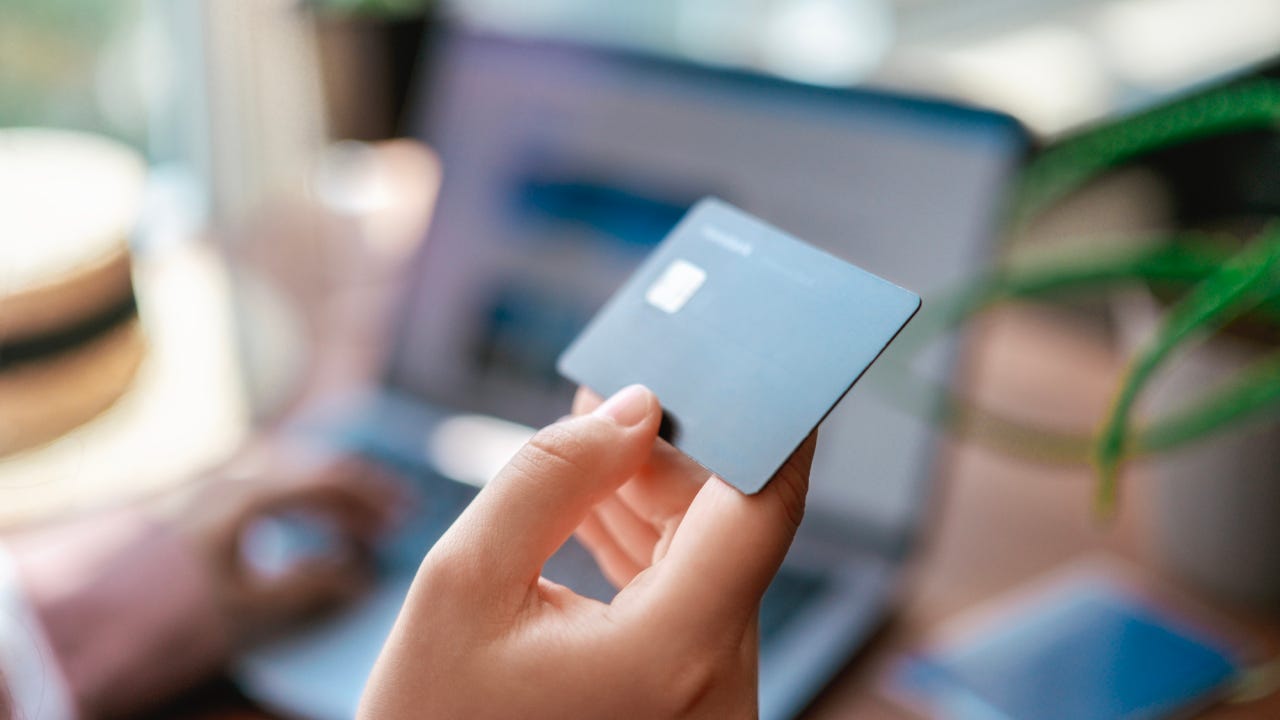 Credit card in hand close up