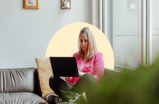 Karen Bennett working on a laptop