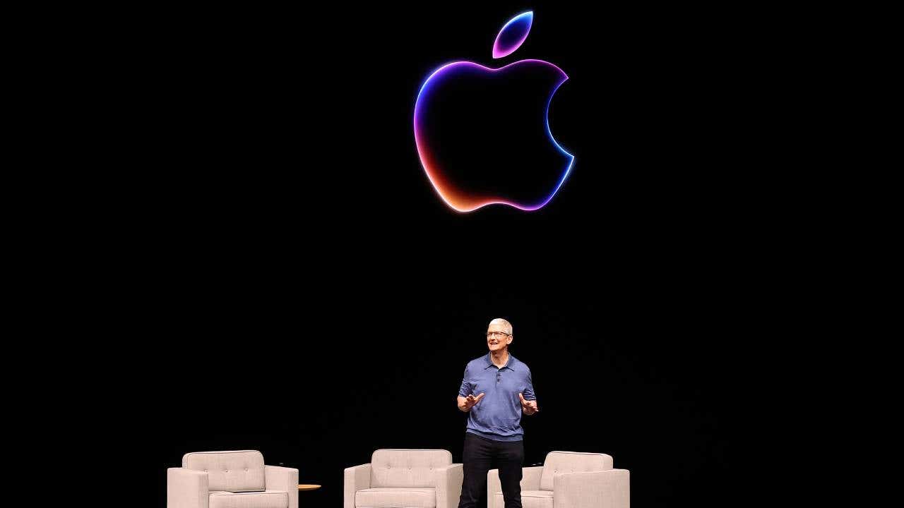 Apple CEO Tim Cook presenting onstage at the Worldwide Developers Conference in June 2024.