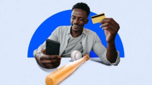 Design element of a man holding a credit card and a cell phone smiling