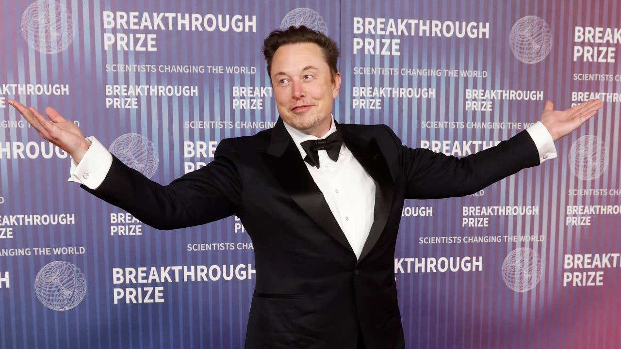 Elon Musk wearing a tuxedo.