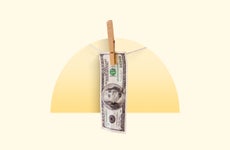 A 100 dollar bill hanging on a closeline