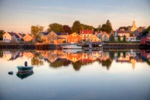 waterfront homes in portsmouth, new hampshire, reflected in water