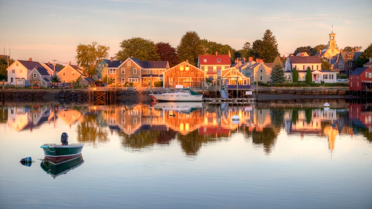 waterfront homes in portsmouth, new hampshire, reflected in water