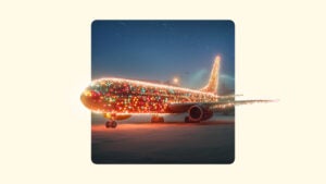 An aeroplane covered in holiday lights