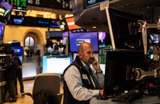 Traders work on the floor of the New York Stock Exchange on September 18, 2024 in New York City.