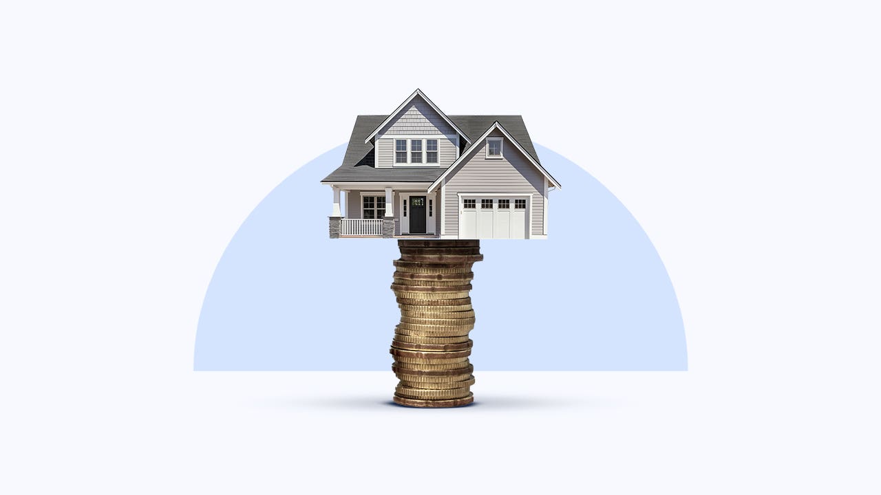 A house sitting atop a stack of coins