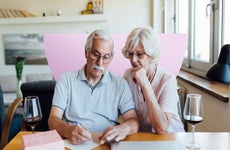 Two people sitting at a table.