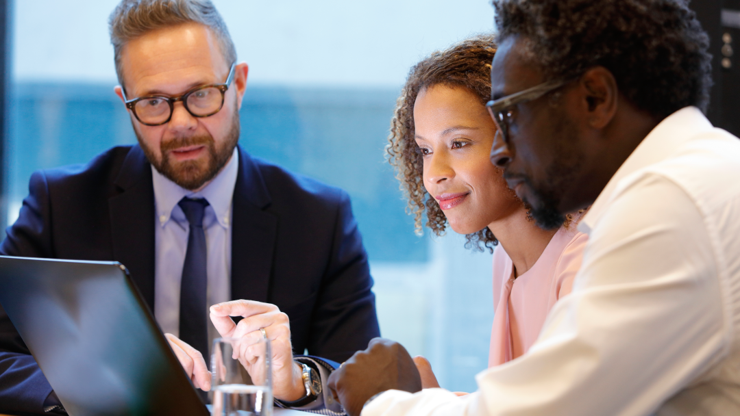 Financial advisor having a meeting with clients - stock photo