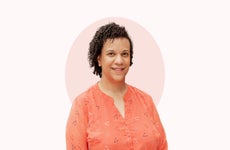 Shannon Martin, female insurance agent, smiling in bright-colored shirt