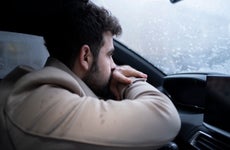 Young Man in a Car