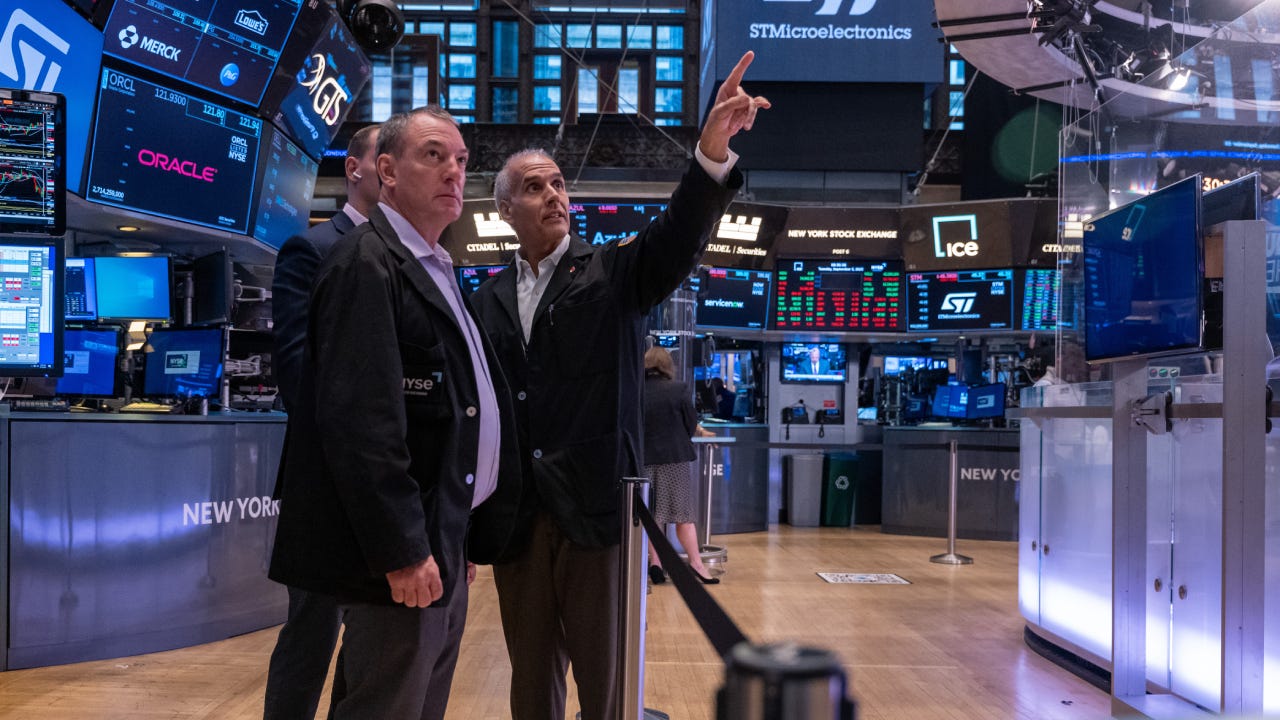 Traders work on the floor of the New York Stock Exchange.