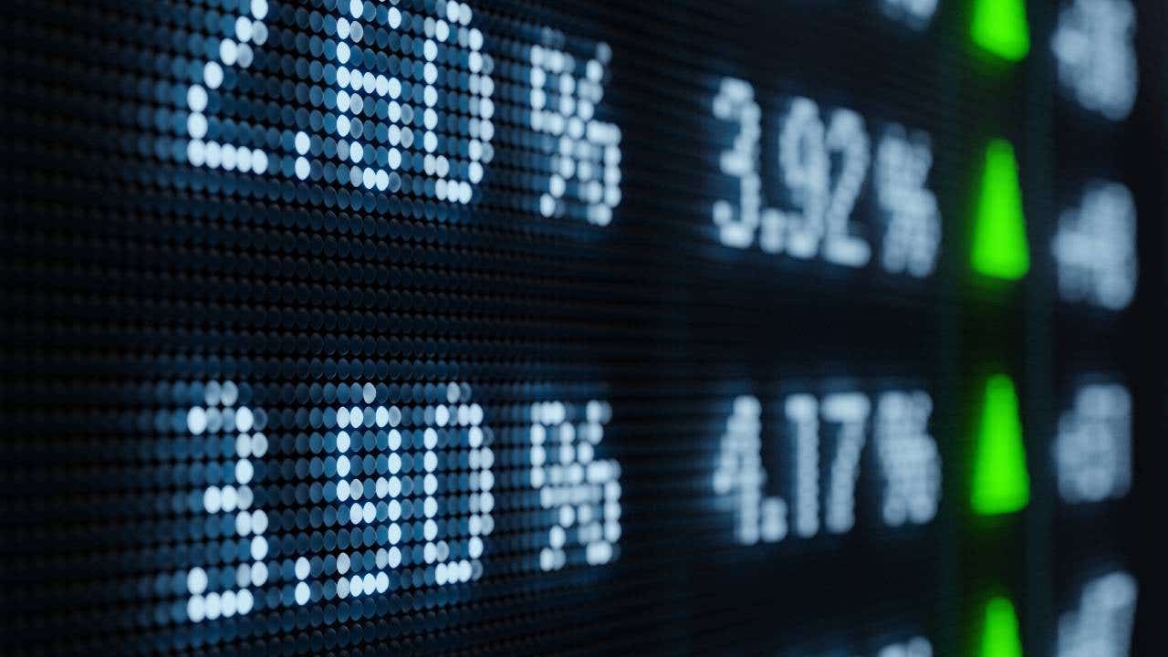 Angled shot of a lit-up display showing bond data.