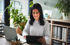 woman performing payroll duties