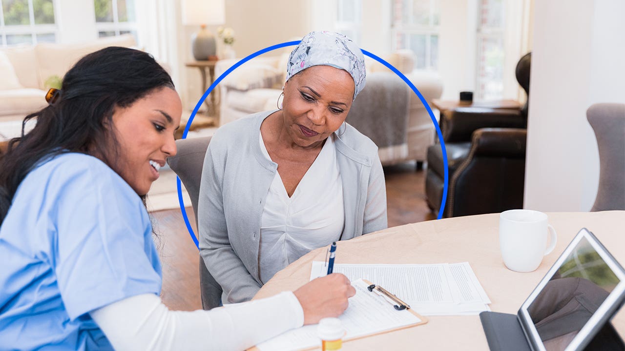 A medical professional consulting with a patient