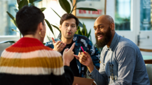 group sharing ideas in office - stock photo