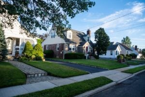 Houses in a suburban neighborhood with sidewalk