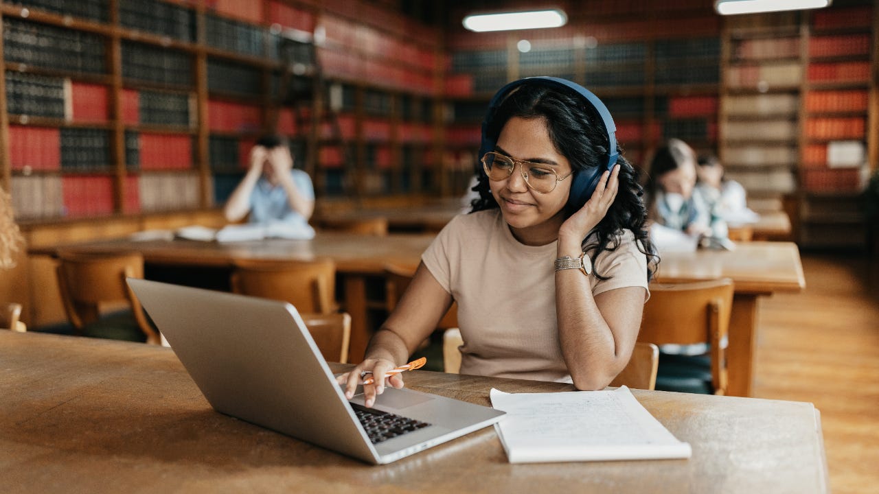 Female student studying in library