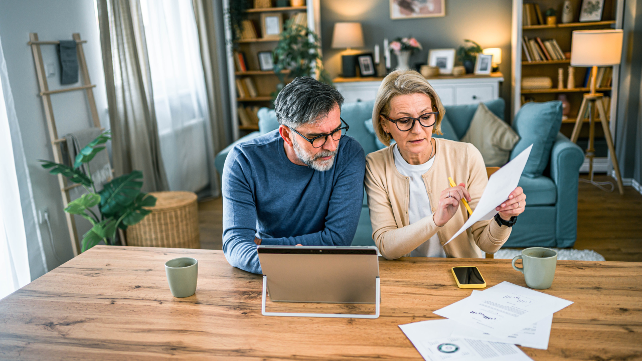 Older couple works on their taxes.