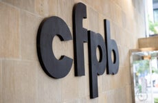 A picture of the side of the Consumer Financial Protection Building, showing the CFPB logo