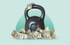 Image showing a dumbbell wrapped with U.S. dollar bills