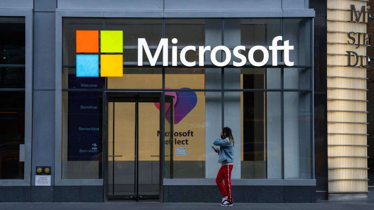 People walk by the Microsoft Office building in New York City.