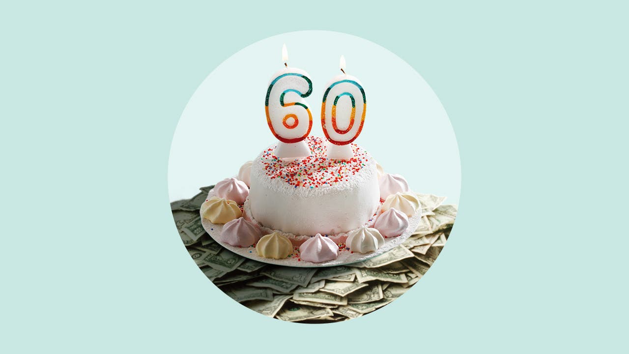 A "60" birthday candle on top of a cake.