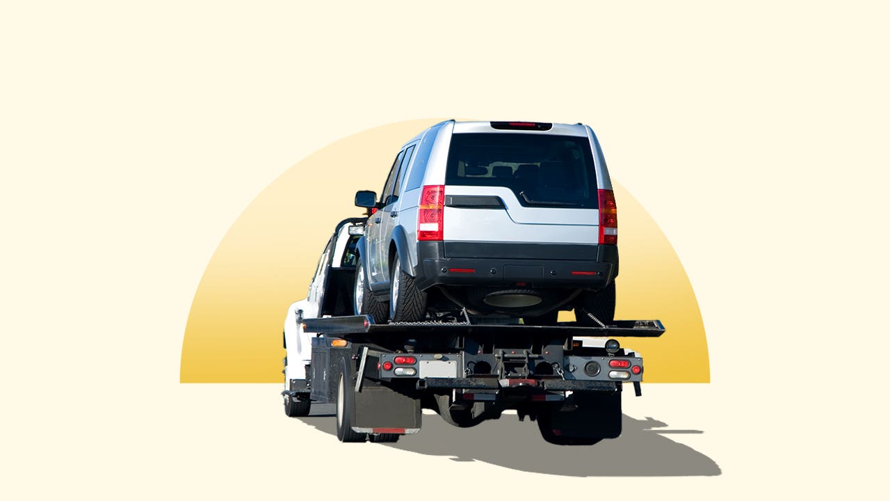 Image of a car being towed