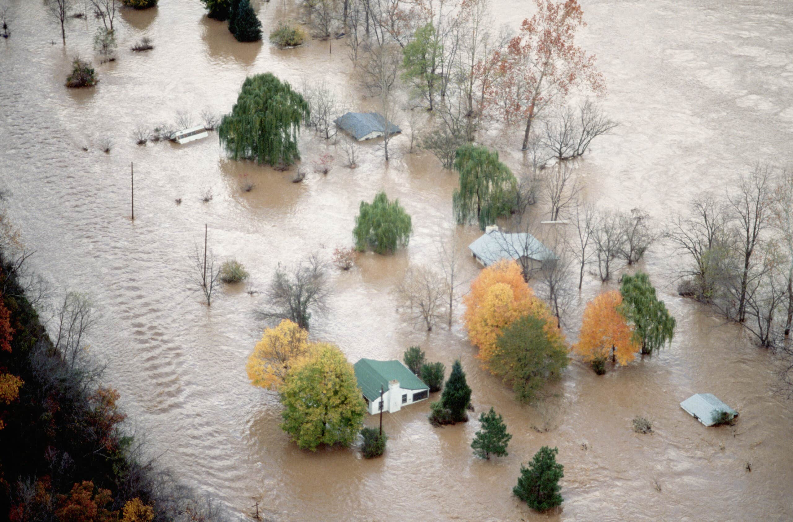 homes and trees in flooded valley